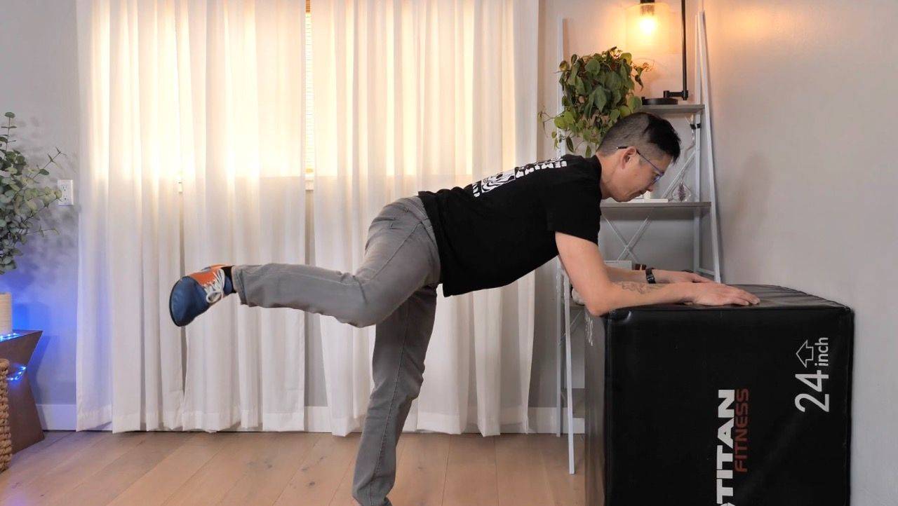 Matt Hsu doing a deep primal squat