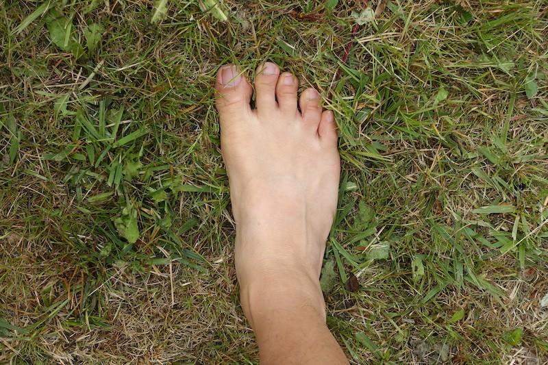 barefoot feet on grass