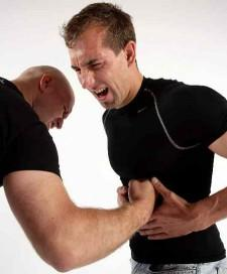man getting punched in the abs