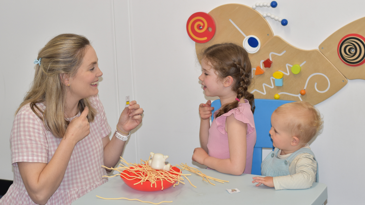Speech therapy session using picture cards to support stuttering, reading and language development at Walky Talky Hub in Perth.