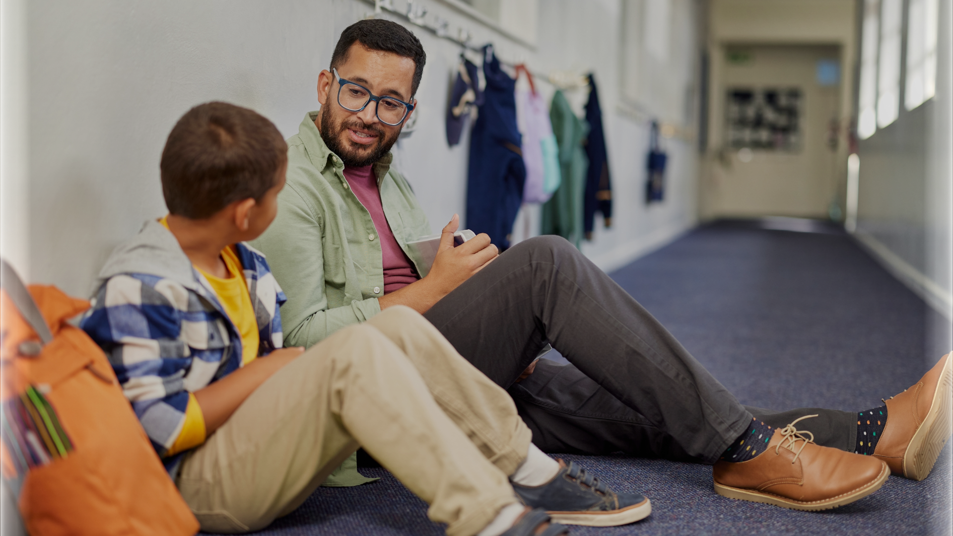 Teacher and young student relaxing