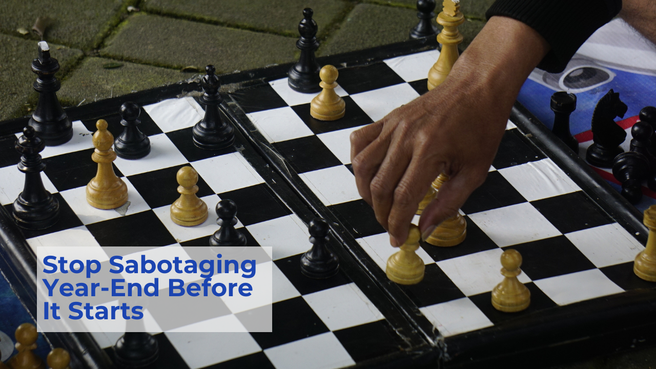 a person moving a pawn on a chess board