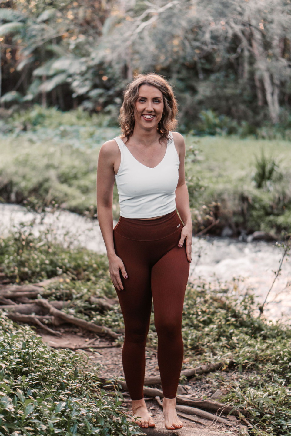 Trauma-informed Yoga teacher guiding a yoga class for autistic students in a neuro-affirming way.