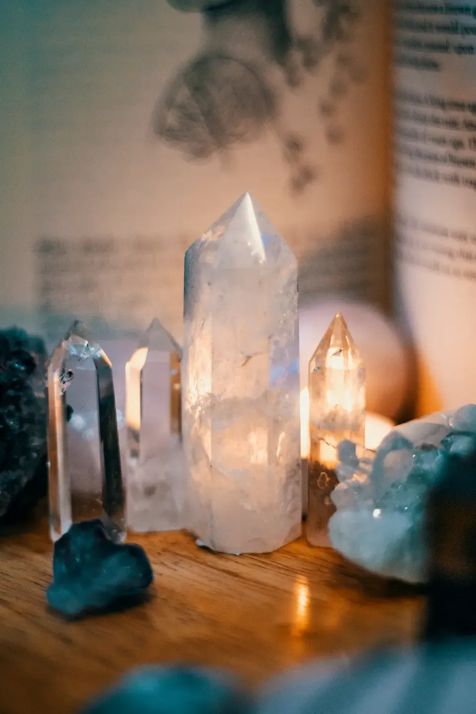 crystals on table with candle energy healing energy healer quantum healing psychic medium