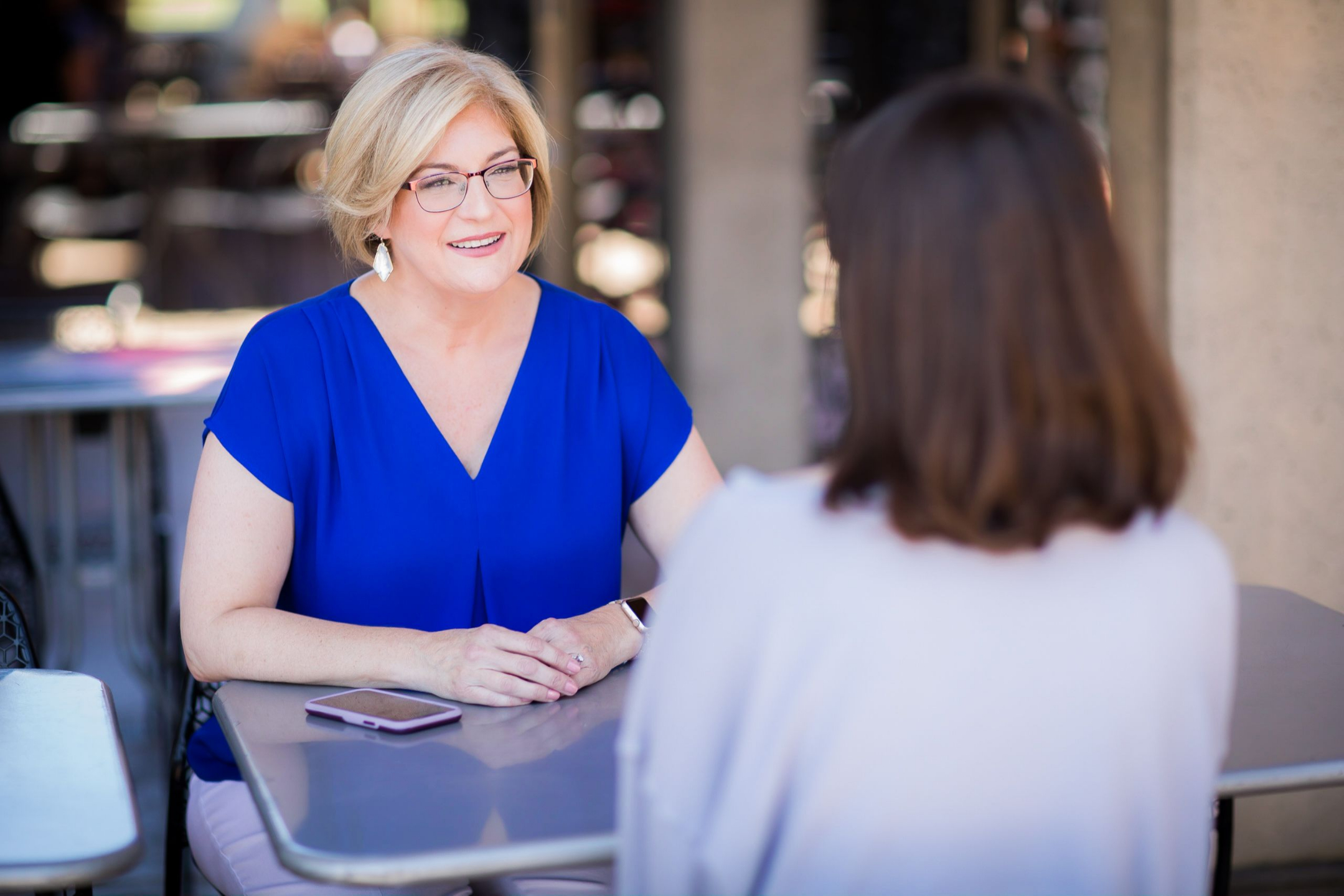 Kathleen Ries-Jubenville coaching a client in person