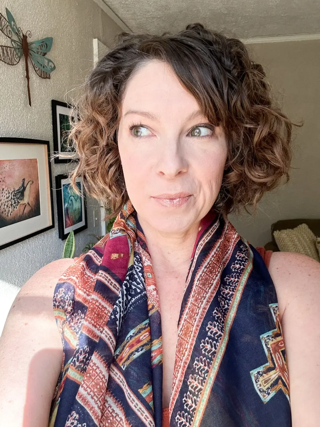 woman with curly hair animal communicator pet psychic animal communication