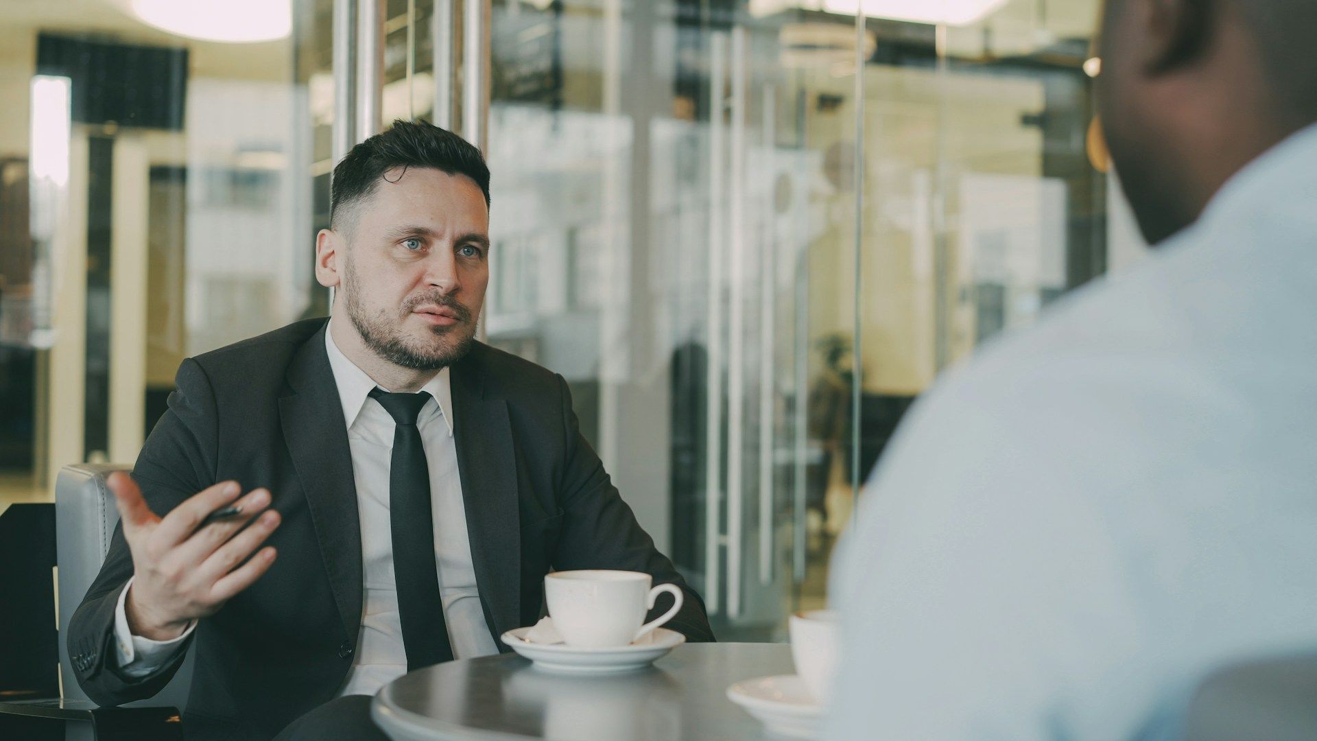Working Conversations Episode 264: two people in a serious conversation
