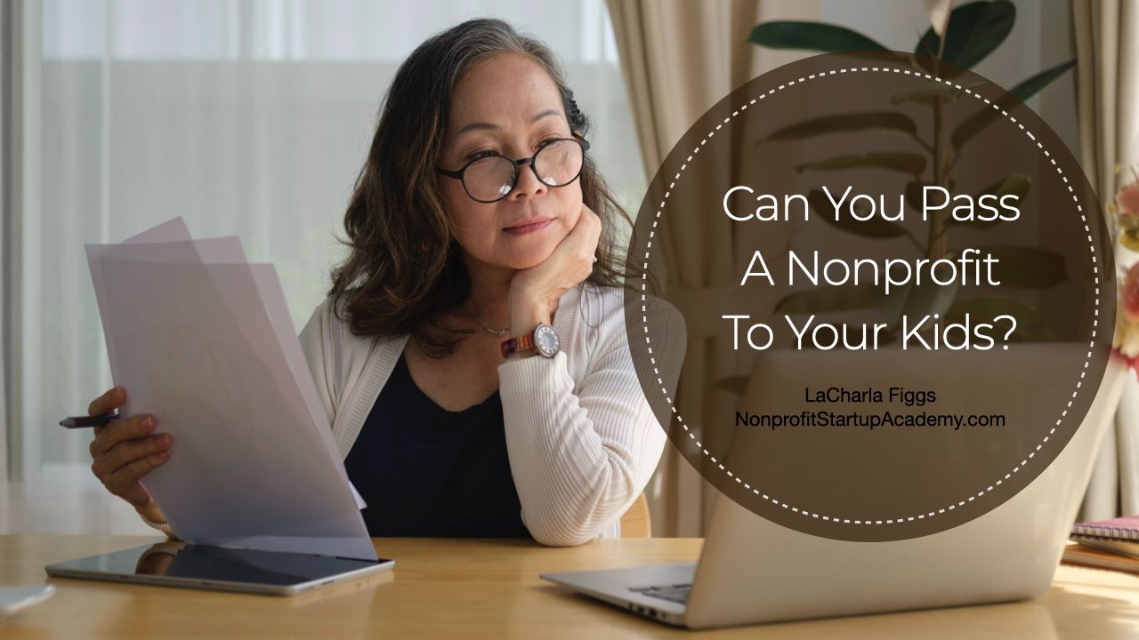 Cover IMG - Woman with Paperwork Looking at Laptop