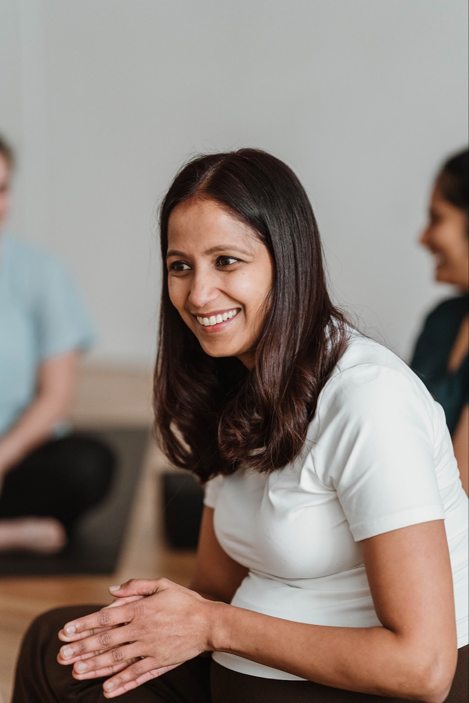 Ragini from Mother'z Yoga with a student