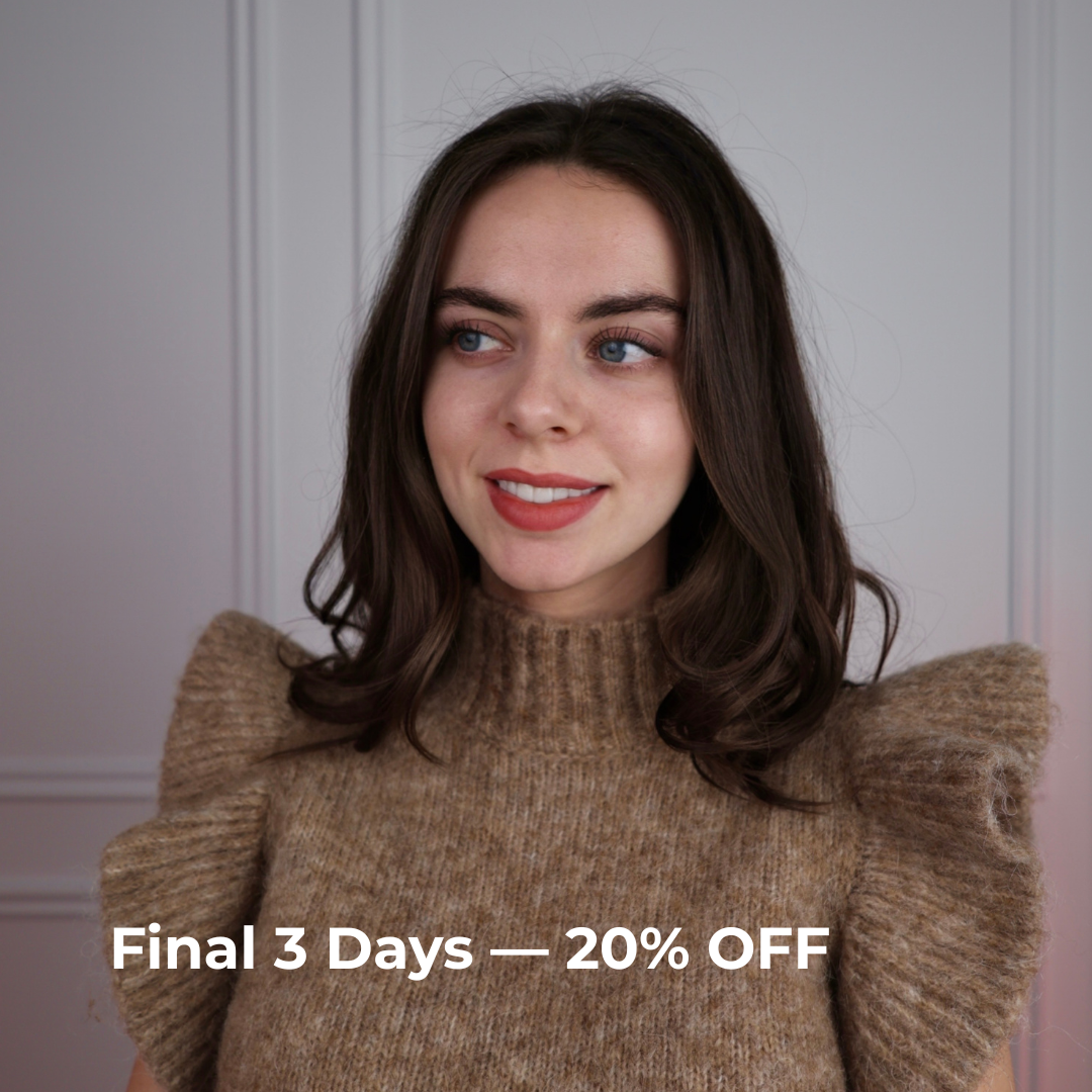 Clémence, French teacher and course founder, smiling in a cozy sweater