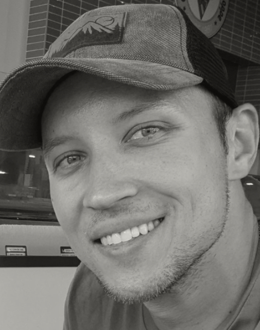 Satisfied smiling client named Andrea B.