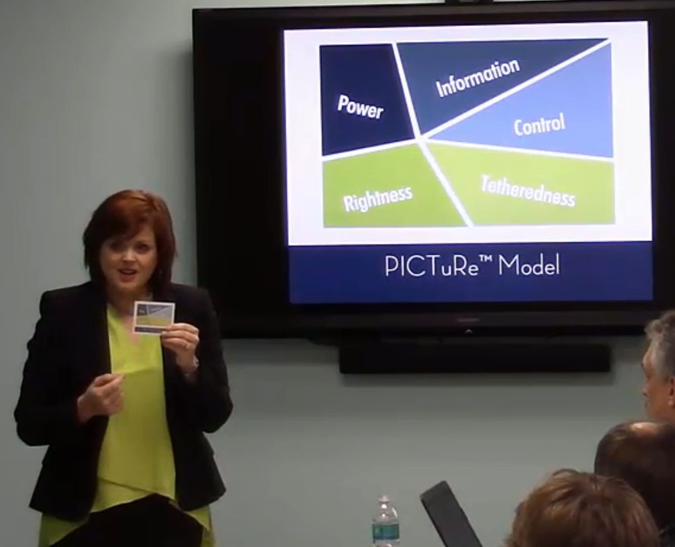 Dr Erika Salina teaching a workshop with one of her signature models