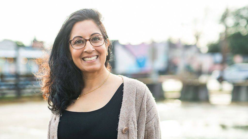 Portrait of Sheetal Ajmani standing outdoors
