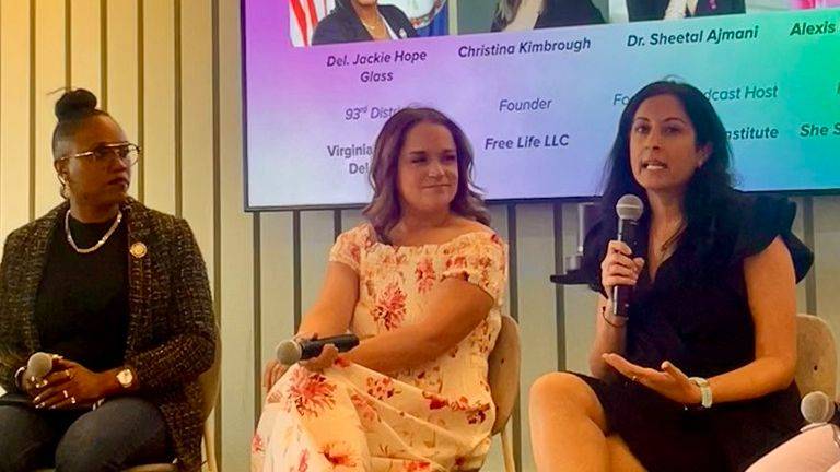 Sheetal speaking in a panel discussion
