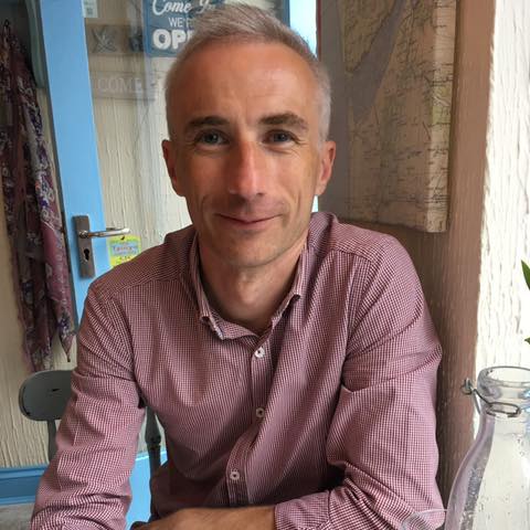 Andy coaching in a cafe in Seville