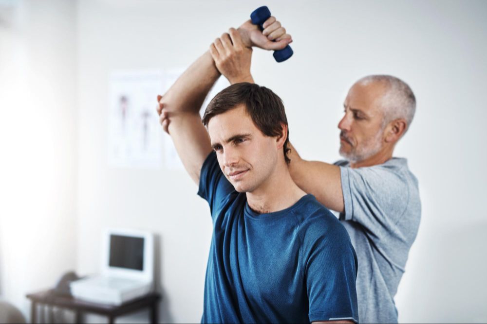 Athlete receiving personalized sports physical therapy treatment in Columbus, OH clinic