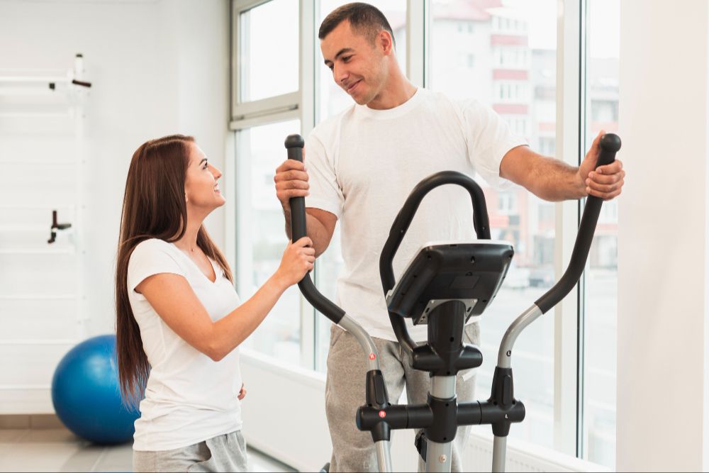 Doctor of Physical Therapy working one-on-one with athlete in Columbus sports physical therapy session