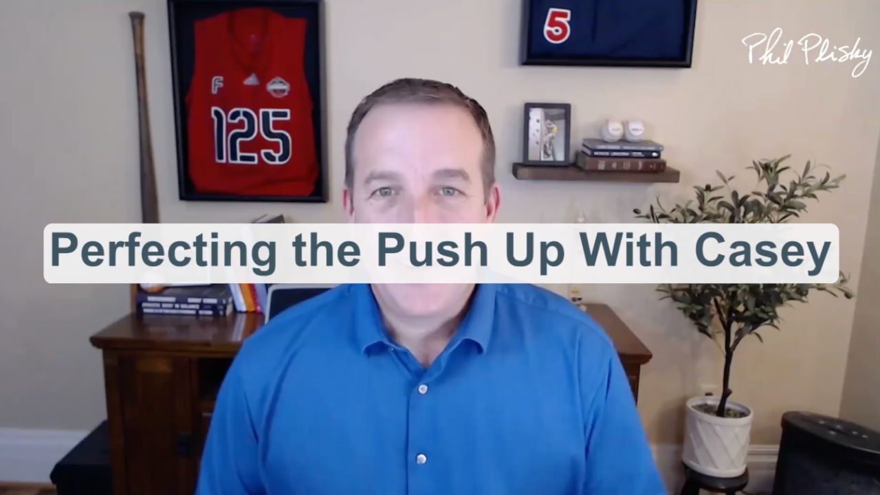 Young male athlete in half-kneeling position