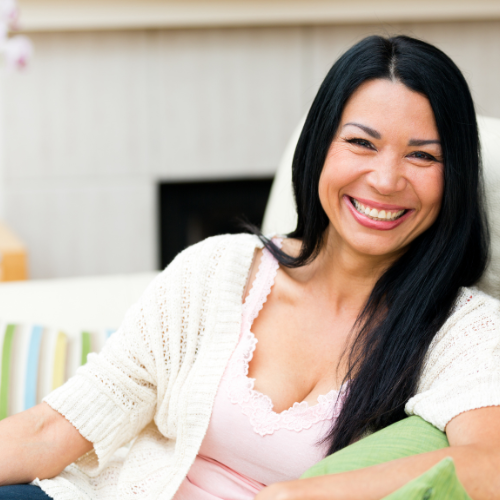 A happy woman smiling at the camera