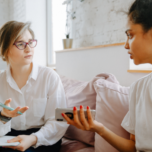 Woman attending a coaching session with a professional