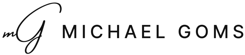 Michael Goms Logo