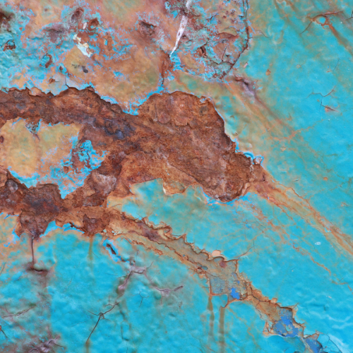 Blue and rusted surface caused by oxidative damage
