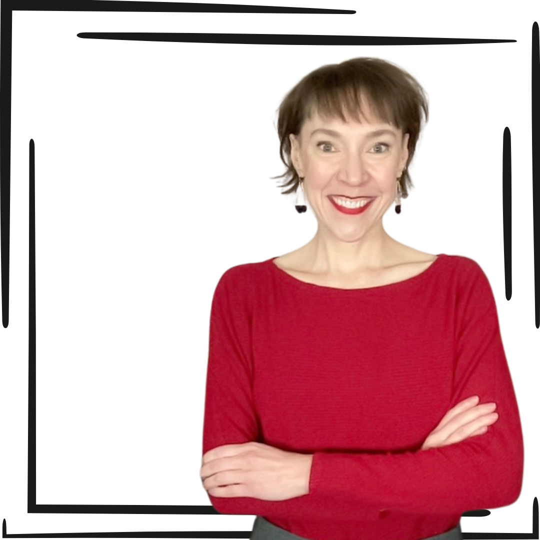 Penny Casselman smiling in an outdoor setting arms crossed holding a cocktail