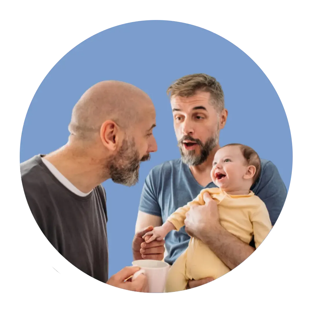 Happy man holding baby