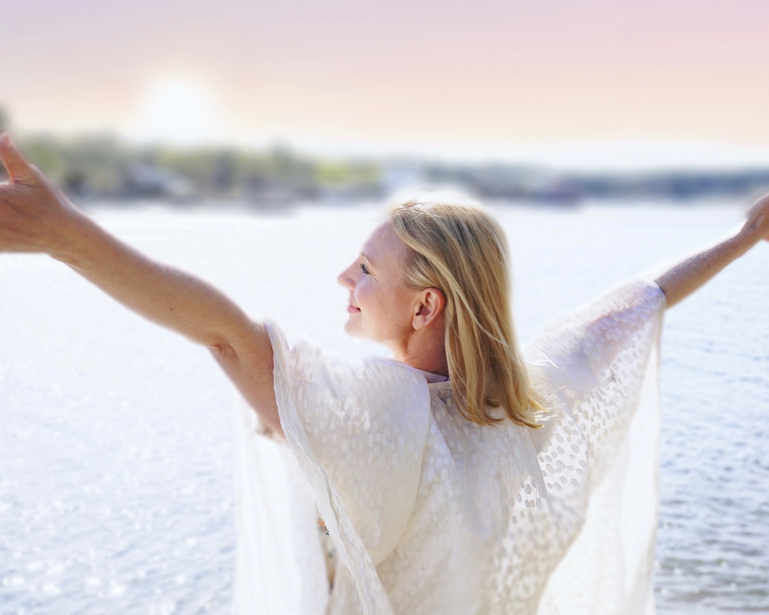 Sofia standing outdoors, swinging her arms side to side, smiling. 