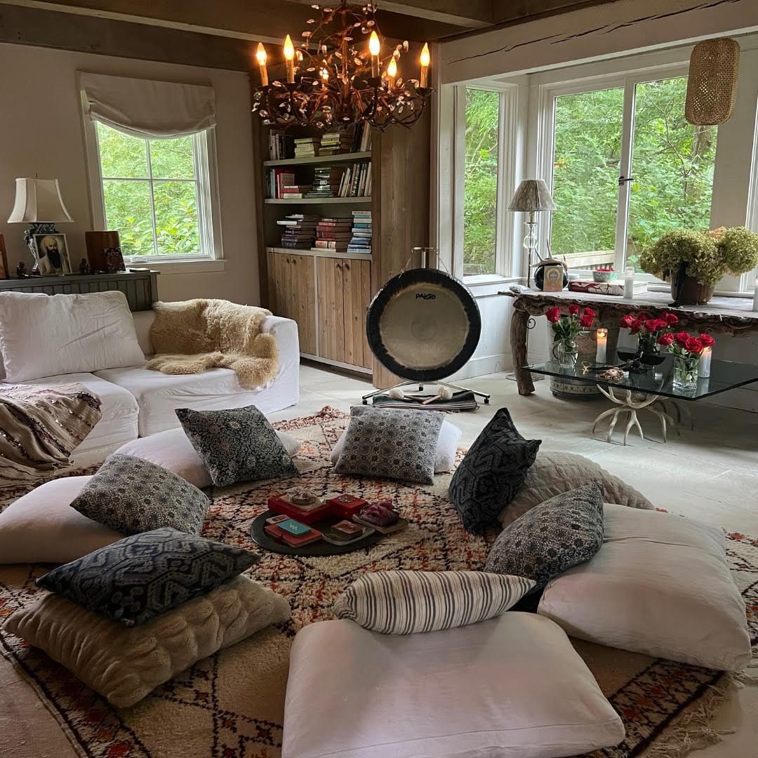 Two women holding their heart and womb in Temple143 Brooklyn, New York