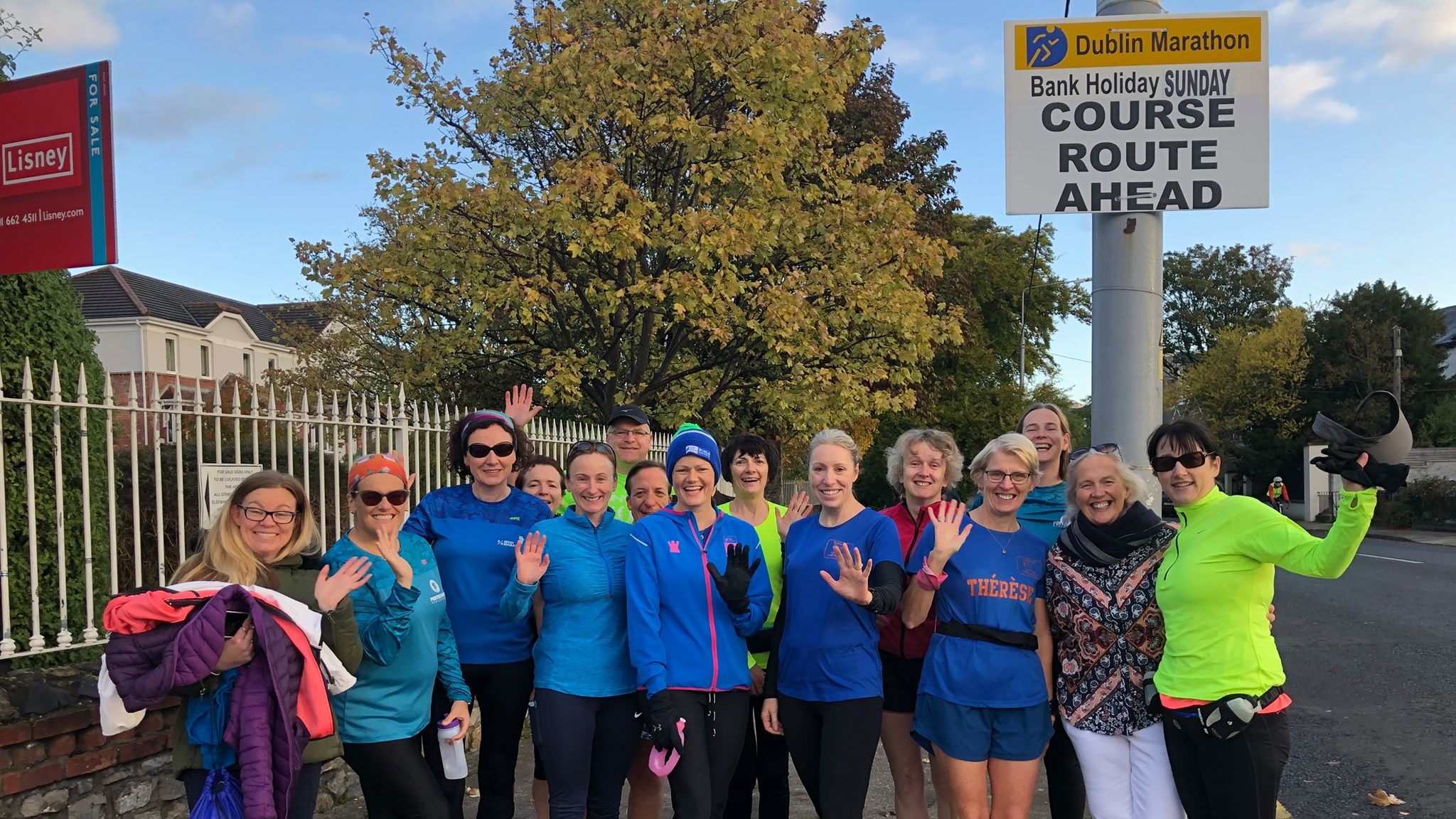 Forget The Gym runners smiling and waving