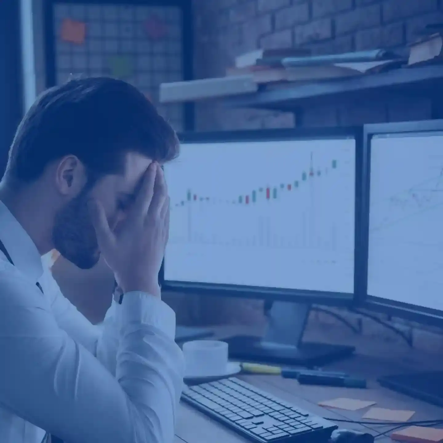 Frustrated Commercial Real Estate Investors sitting in front of computer