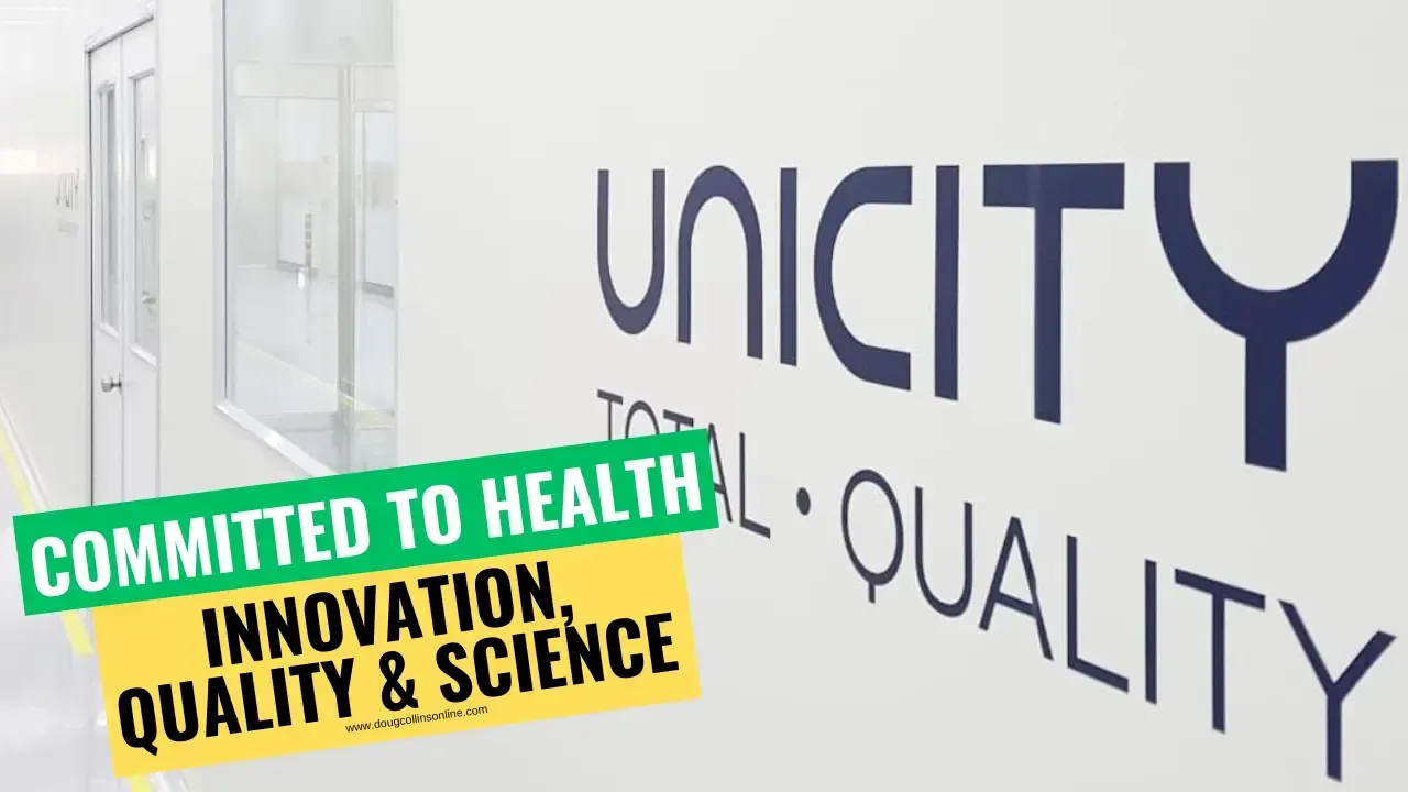 Image of inside the Unicity Manfacturing facility that says Unicity Total Quality on the wall with text overlay that says "Committed to Health: Innovation, Quality and Science"