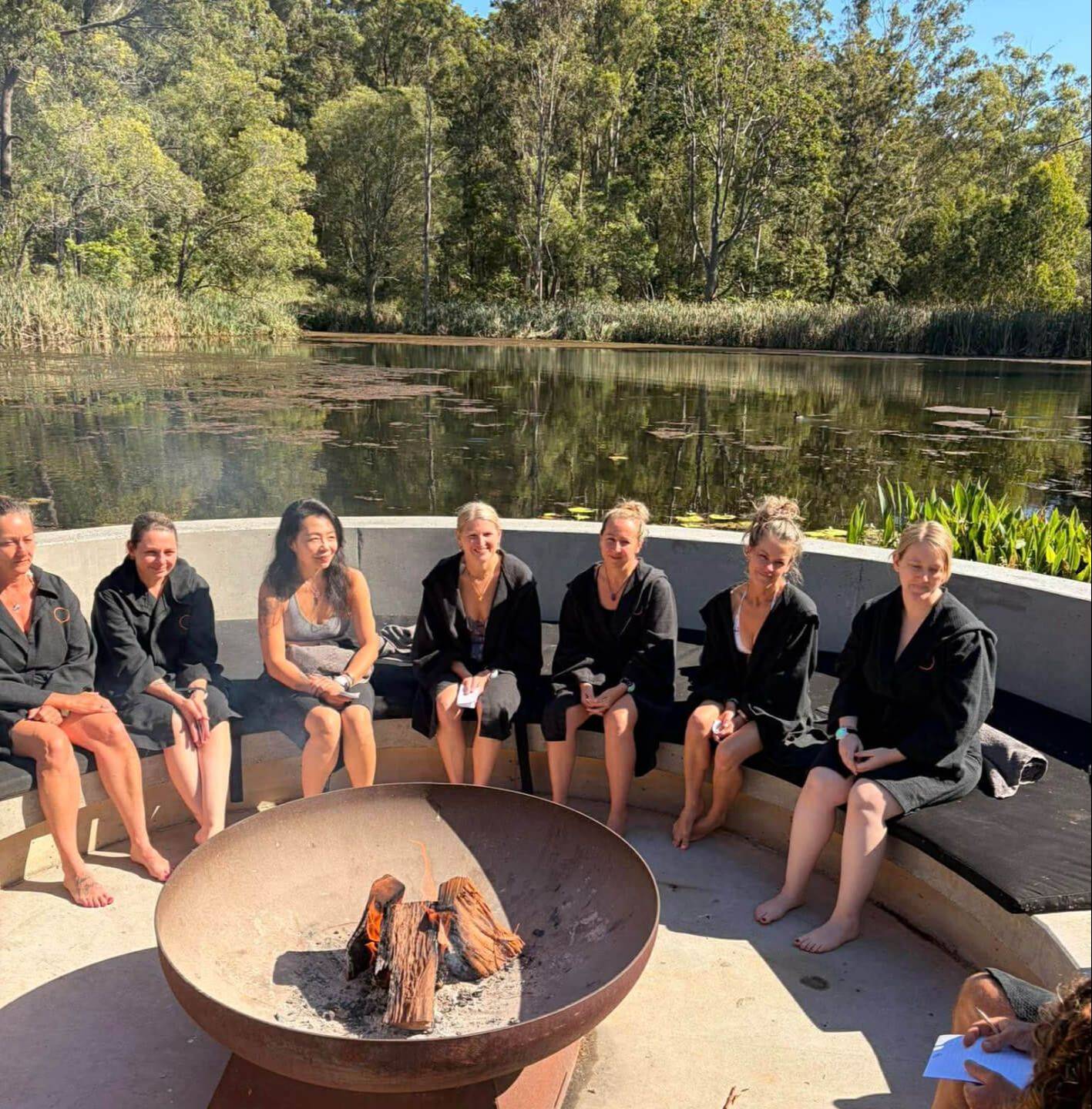 woman gathered in a bonfire for a sharing on the experience and how they felt with the sound heals mastery retreat in Holistic Wellness Academy