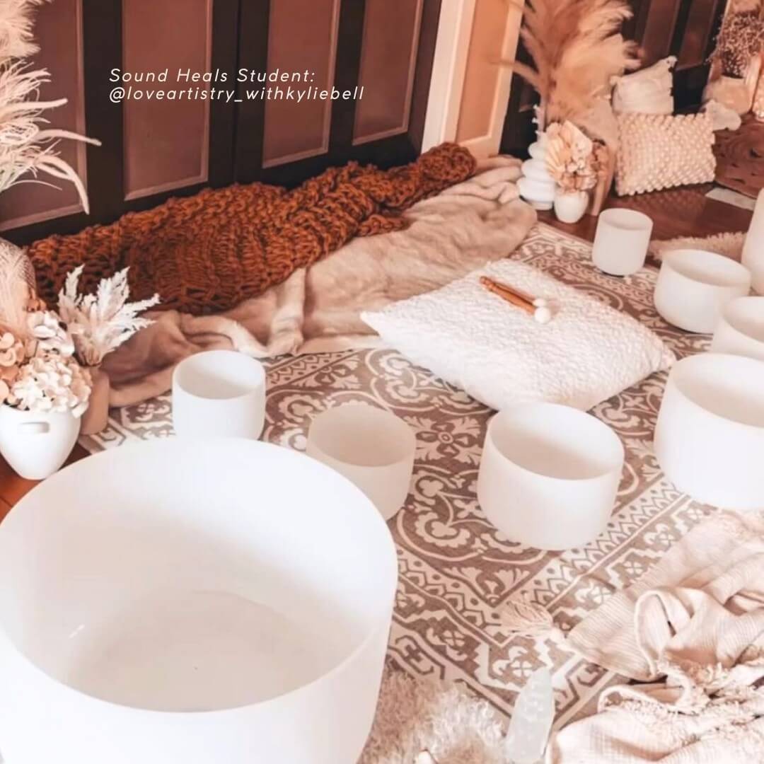 Crystal singing bowls arranged for a calming sound healing session with meditation space