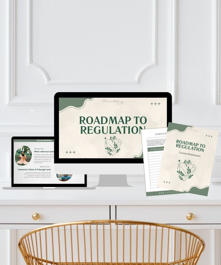 Open laptop on desk with image of Trauma Alchemy Course on the screen