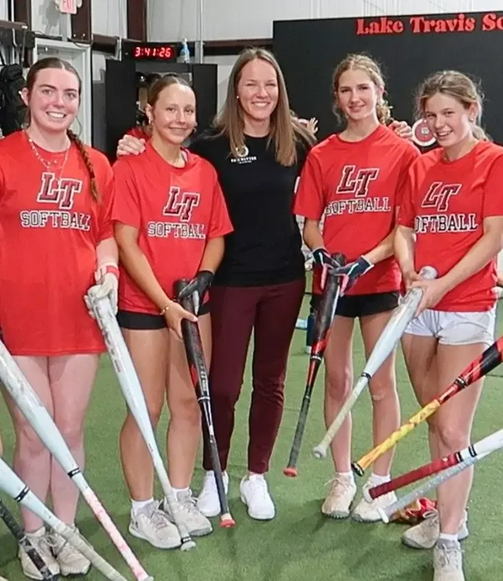 Dr. Ashley Kuchar with athletes from Lake Travis High School