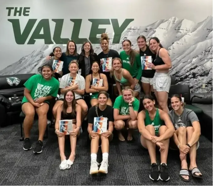 Dr. Ashley Kuchar with UVU basketball team