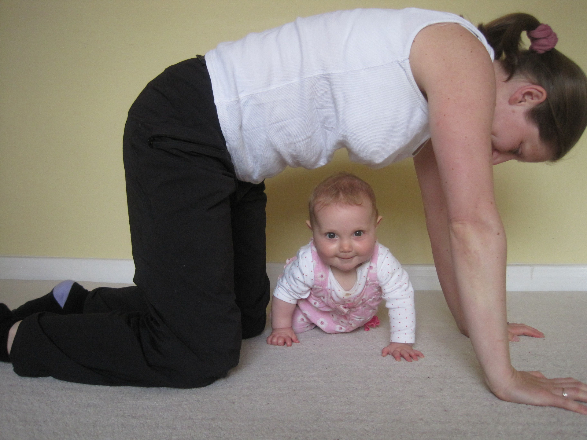 Gila Archer working with baby crawling