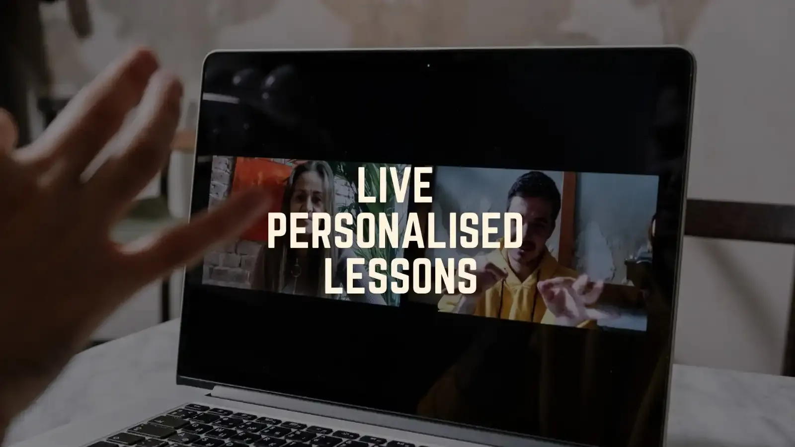 Course card for Live Personalised Lessons showing a hand reaching toward a laptop screen on Zoom