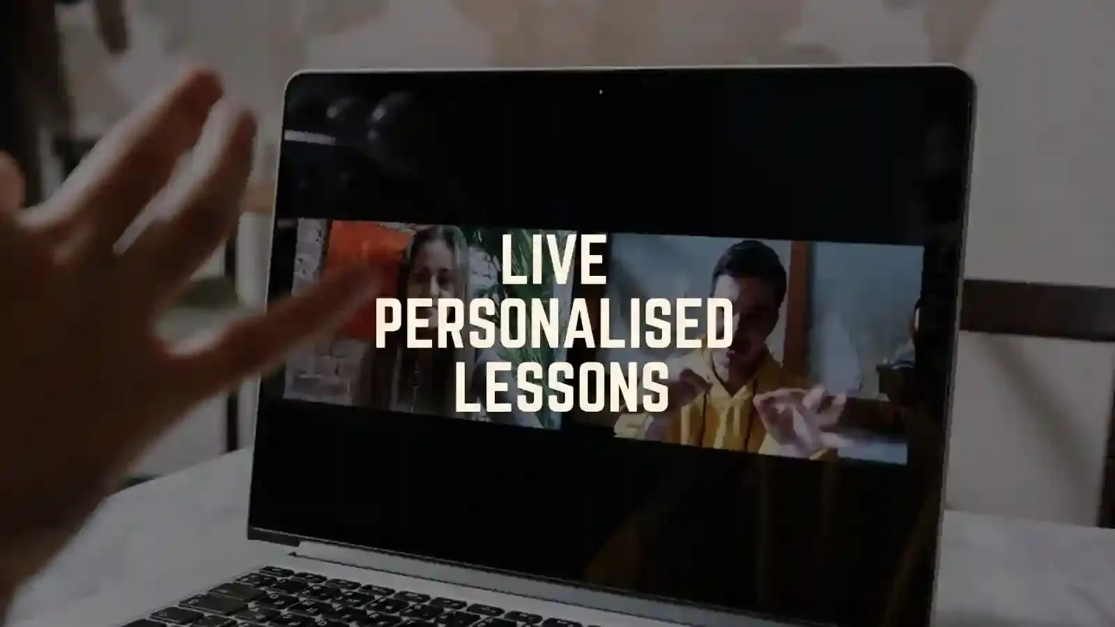 Course card for Live Personalised Lessons showing a hand reaching toward a laptop screen on Zoom