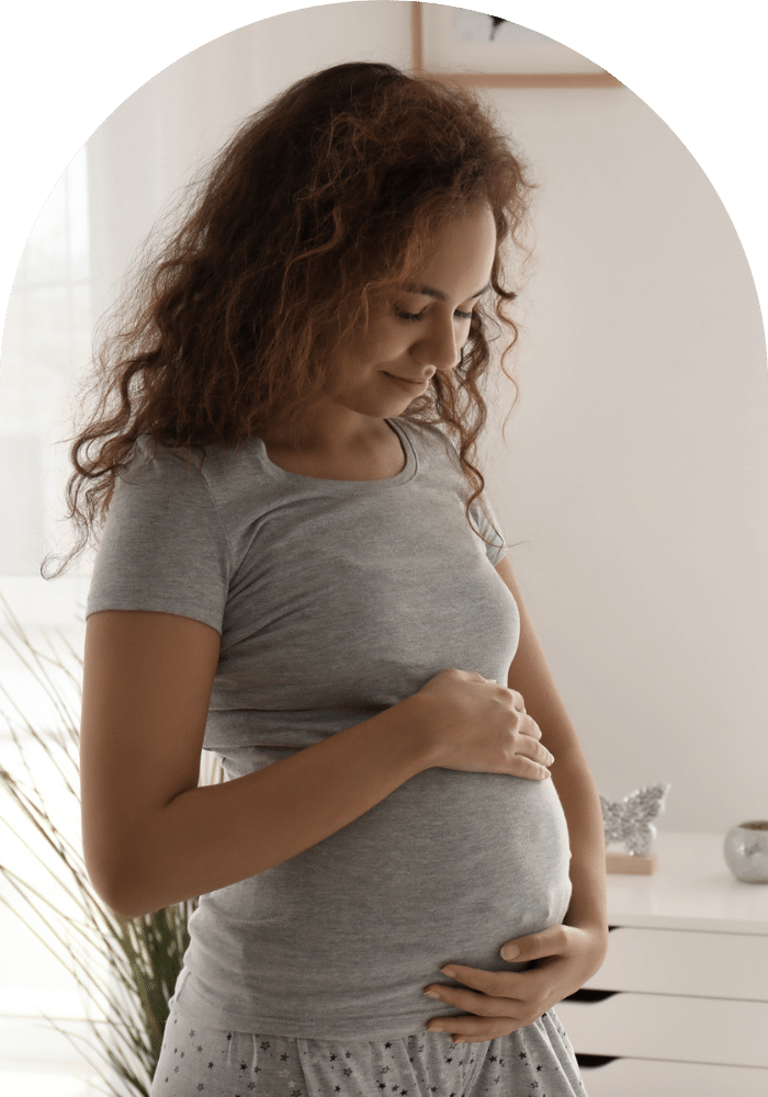 Morning of Beautiful Pregnant African-American Woman at Home