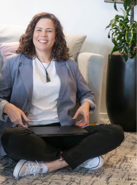 Sam Browne in a hat scrolling on a tablet