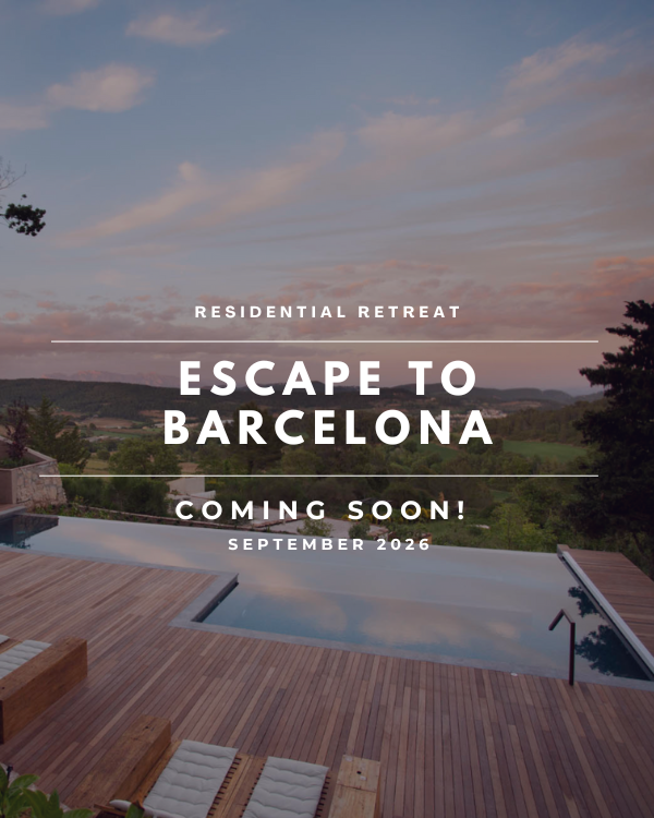 Four middle aged women outdoors all laughing wearing yoga clothes and carrying yoga mates