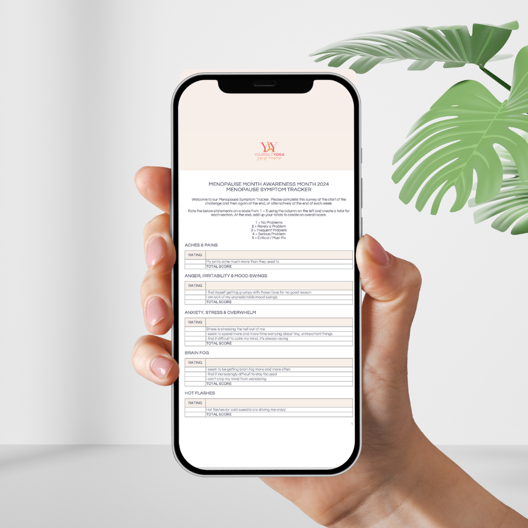 Practice calendar on tablet device alongside phone and laptop showing Julie Ann Garrido teaching yoga for menopause