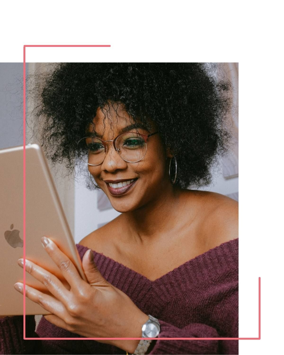 Close up of middle aged woman smiling with positive mindset holing tablet device in one hand and smiling