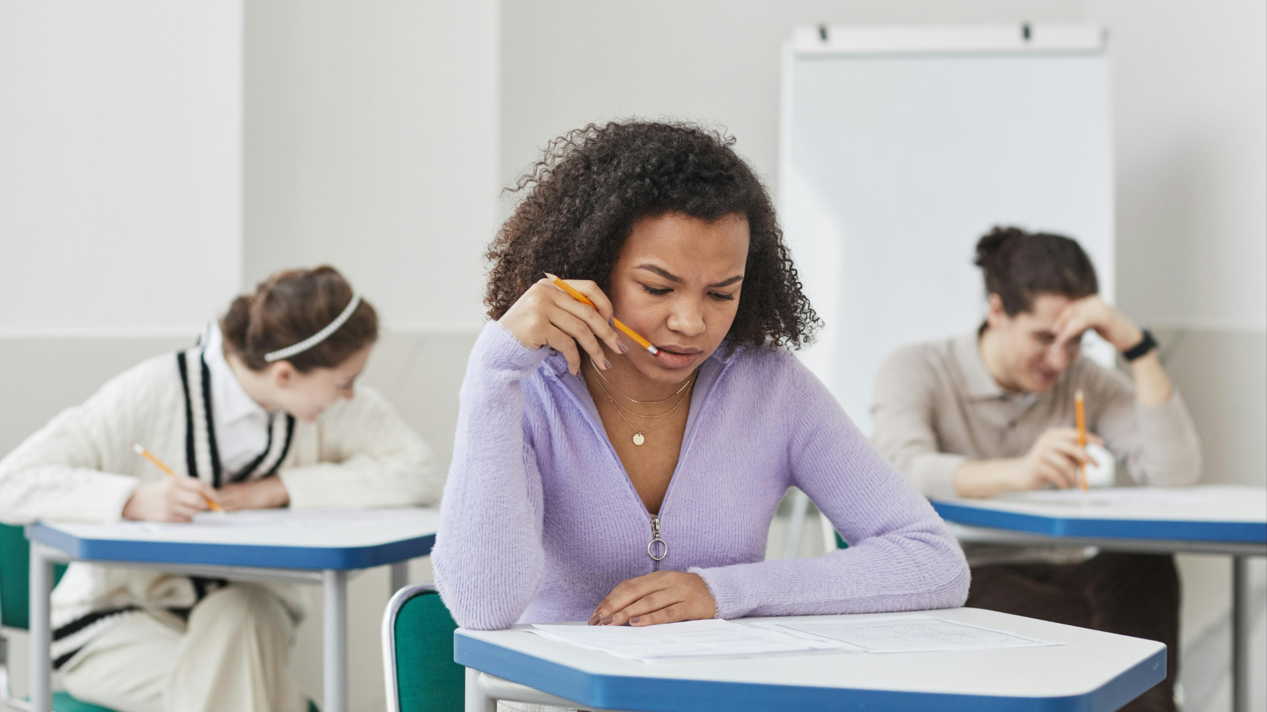 frustrated teen girl in classroom