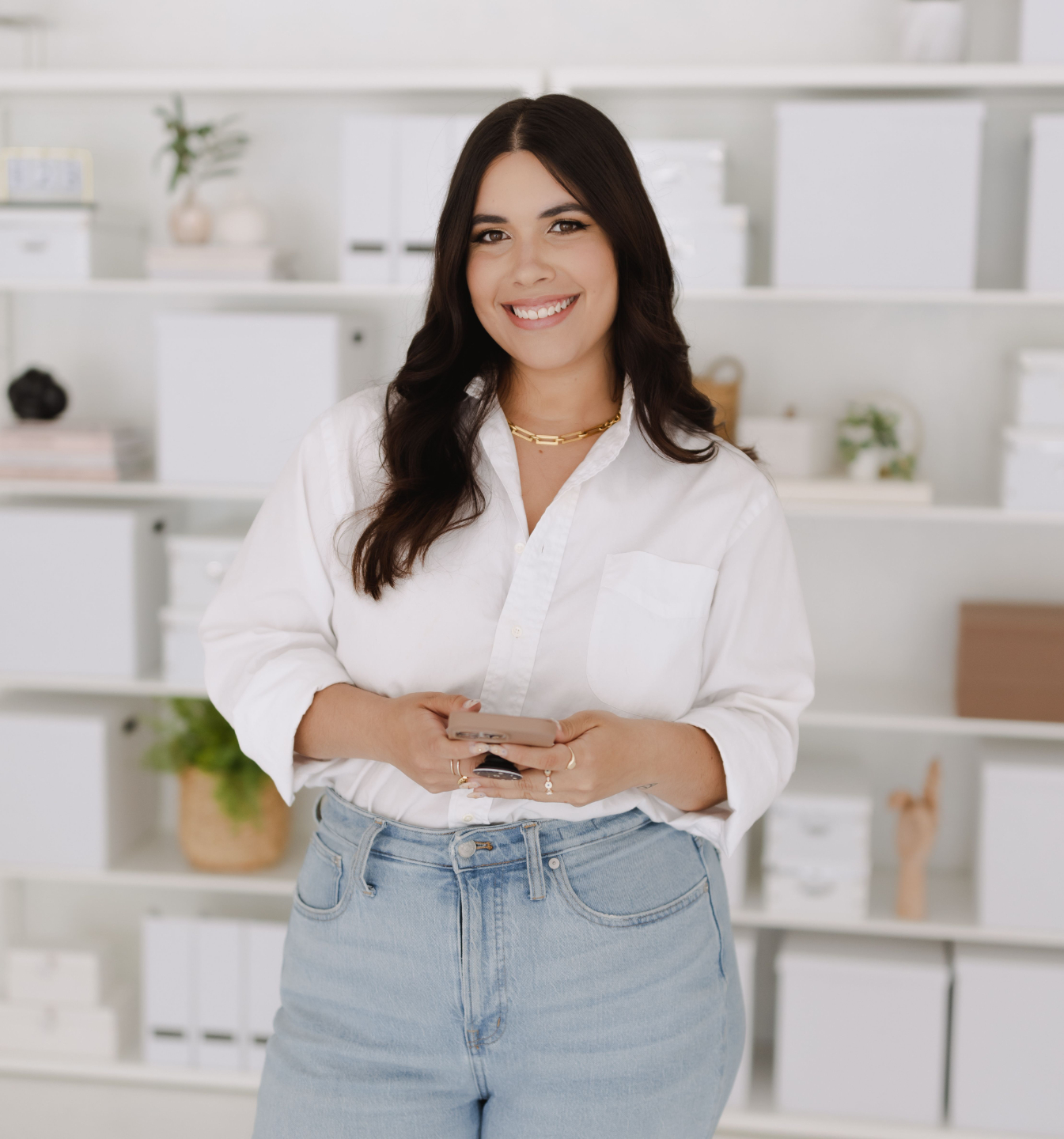 Alex laughing leaning against a bike in Amsterdam
