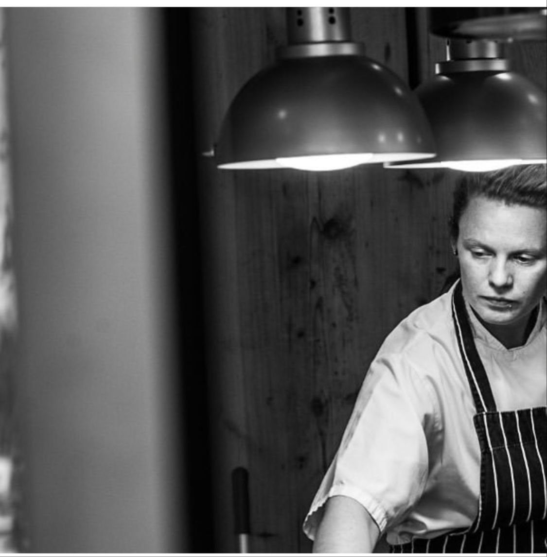 Del prepping vegtables in the kitchen