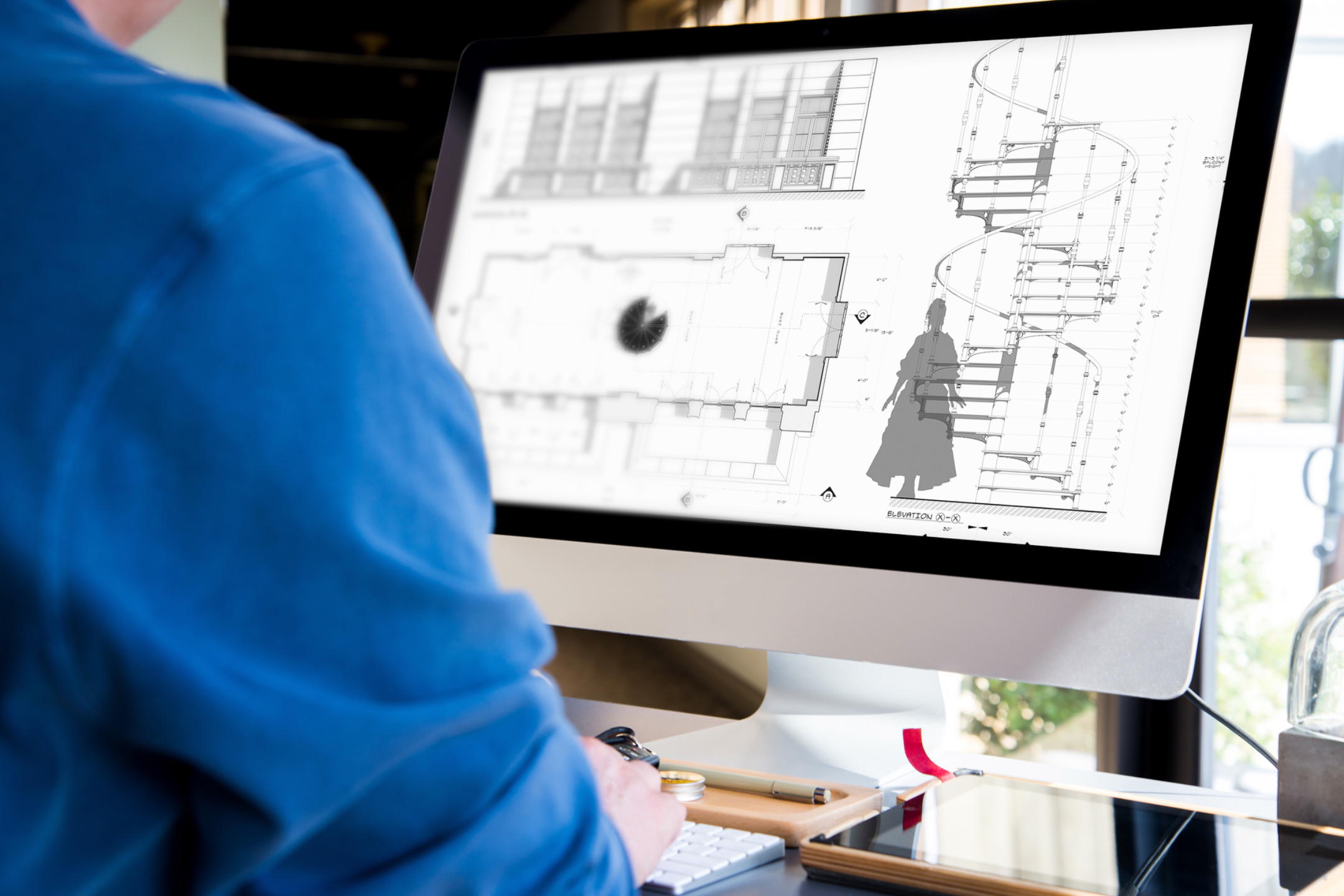 Man doing my staircase asset pack course on an iMac